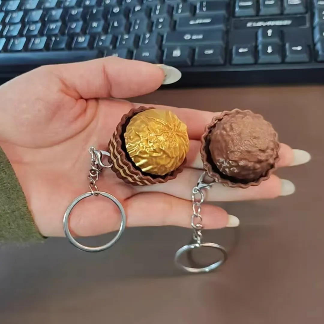 Food Sweet Snacks - ميدالية مفاتيح دبي شوكليت بتصميم لوحة